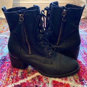 Report black heeled combat boot